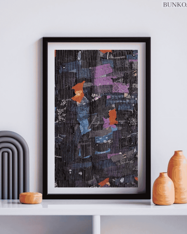 Artistic upcycled textile wall art displayed in a modern interior