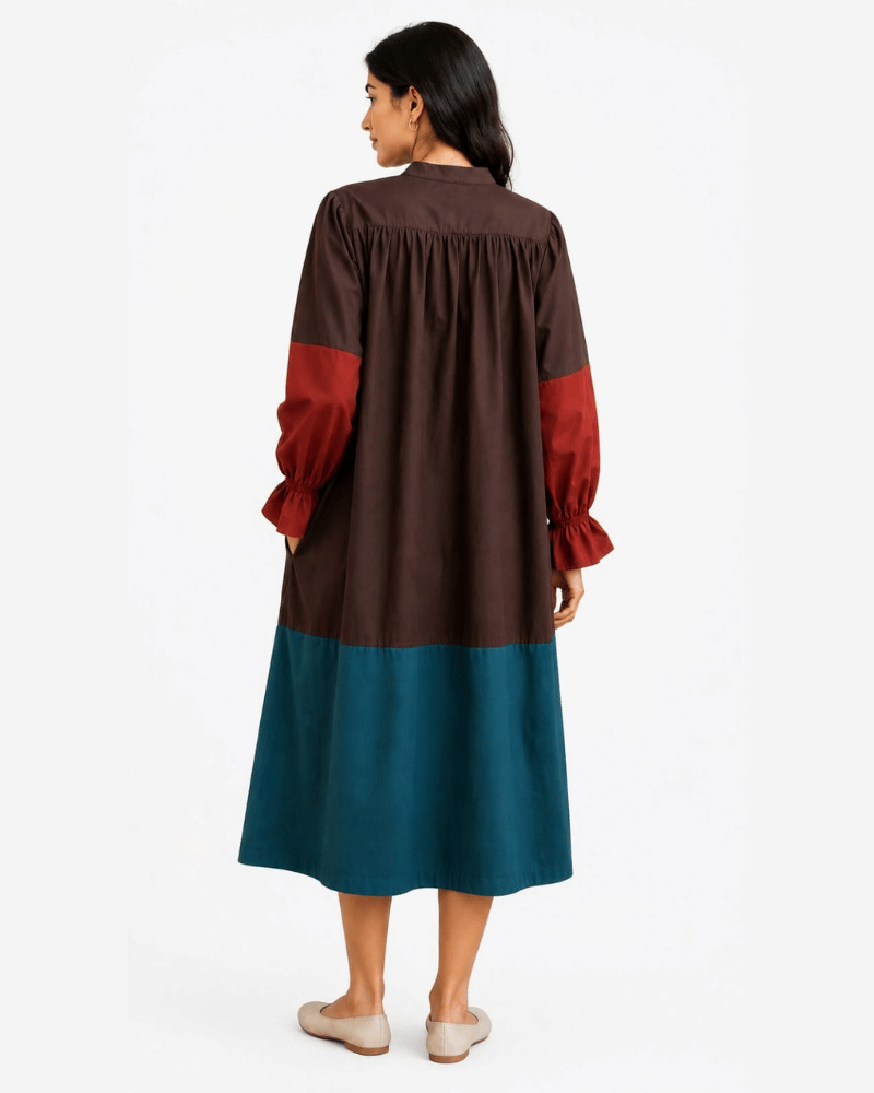 Back view of brown and teal colour block dress with gathered detailing