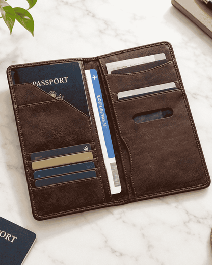 Brown passport cover with multiple card and document compartments
