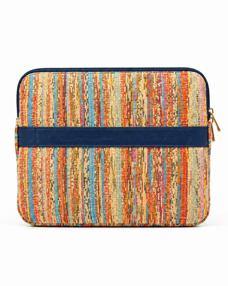 Kora laptop sleeve with brown and grey patchwork design
