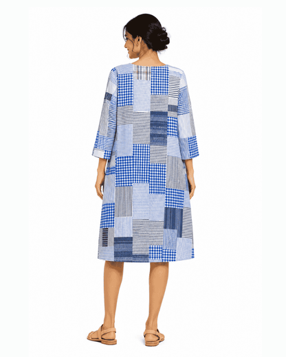 back view of Nilaya blue patchwork dress made from upcycled textiles
