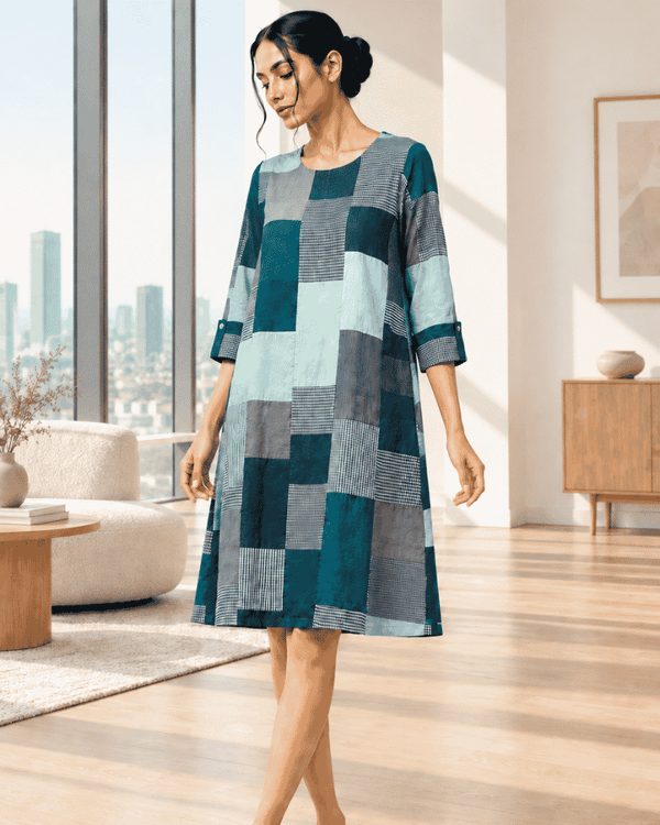 Nira teal and mint patchwork dress with navy and grey panels and three-quarter sleeves