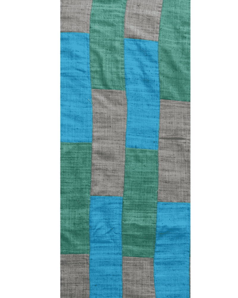 Teal patchwork detail of Patch Fusion upcycled bed runner