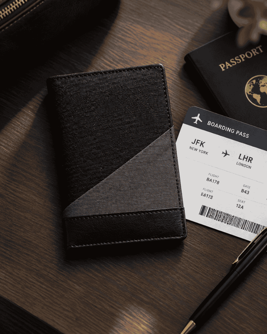 Black Travel Elegance passport holder by Bunko Junko styled with travel documents