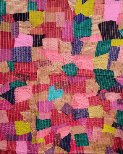 Pink and multicolour upcycled textile panel made from assorted fabric scraps.
